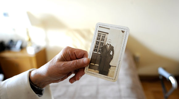 Ashley holding an old photo